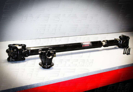 Front and rear Jeep JK driveshaft with solid black tubing, U-joints, and pinion flanges, designed for 2007-2018 4-door models.